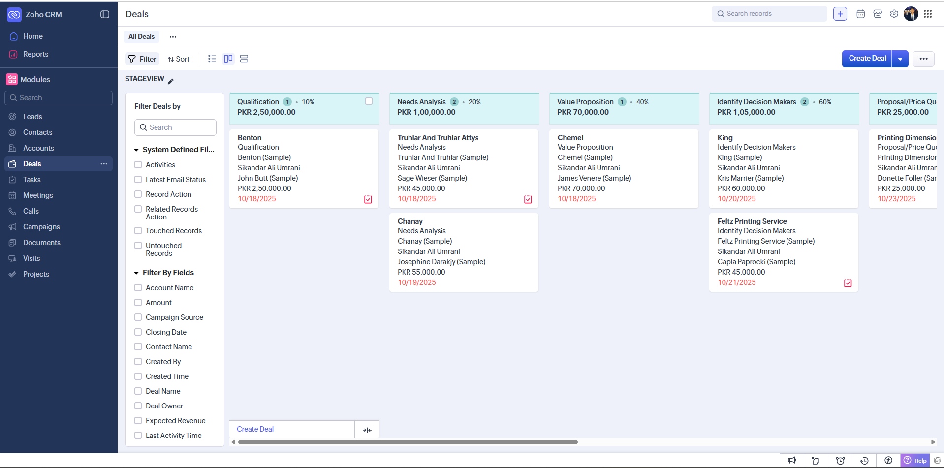Zoho CRM's deal StageView in a trial account, showing a kanban pipeline across the stages Qualification, Needs Analysis, Value Proposition, Identify Decision Makers, and Proposal, with sample deals and a wide list of modules in the left navigation.